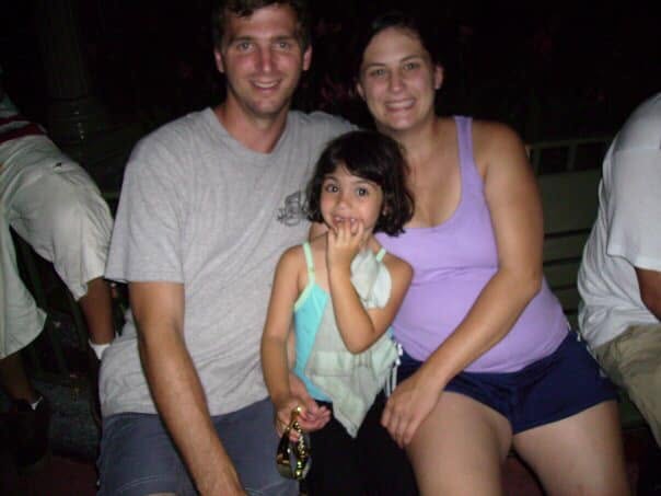 Chris, Pam, and young Maggie together near the beginning of their family story