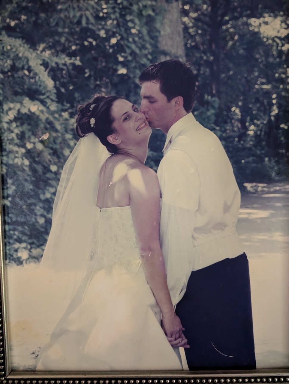 Pam and Chris in their wedding portrait on July 9, 2005